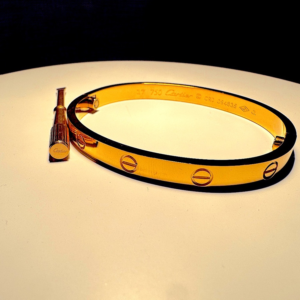 Love bracelet with screw motif and screwdriver - stamped / engraved 750 gold